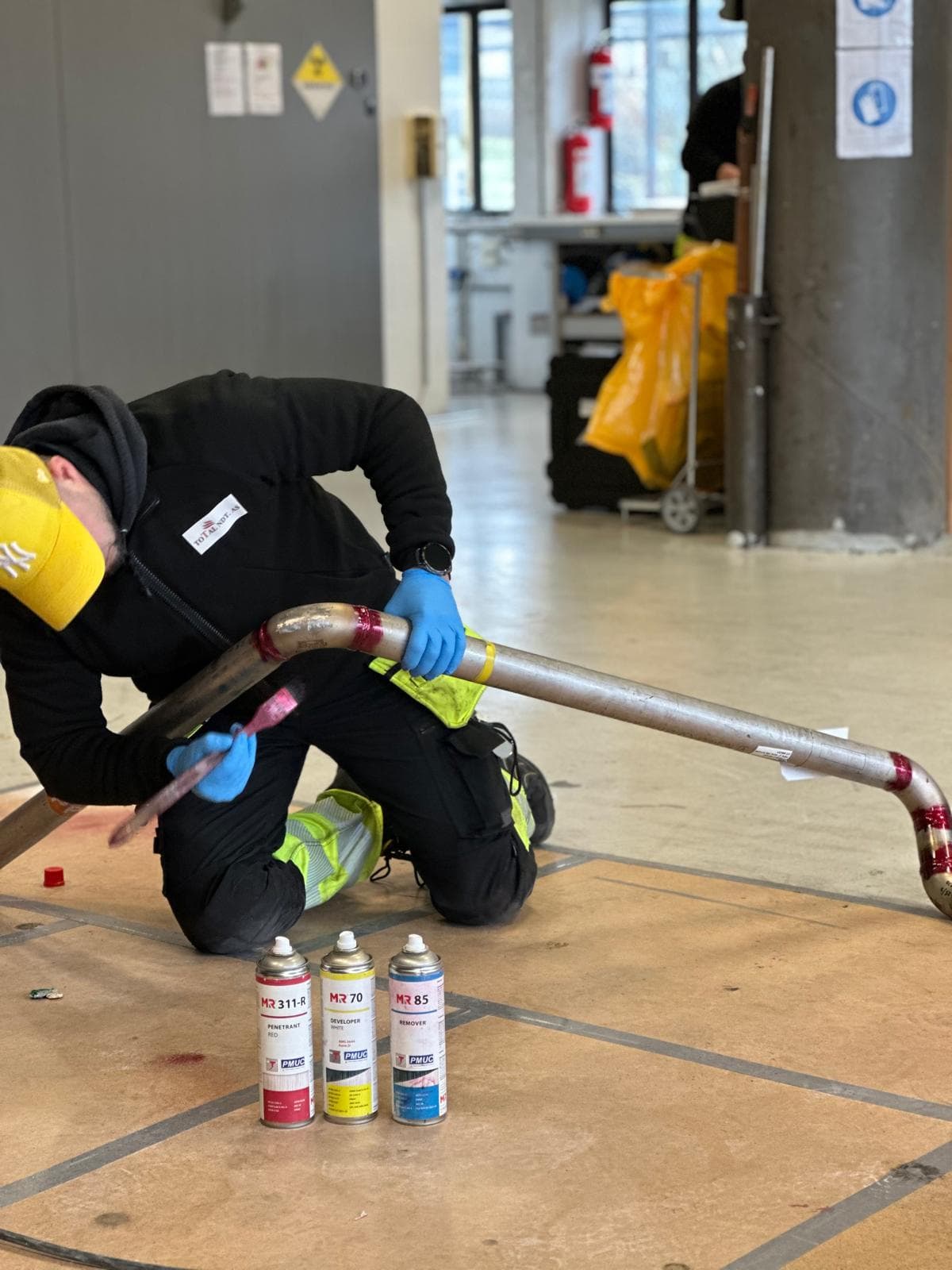 Metal piping inspected using liquid penetrant inspection method